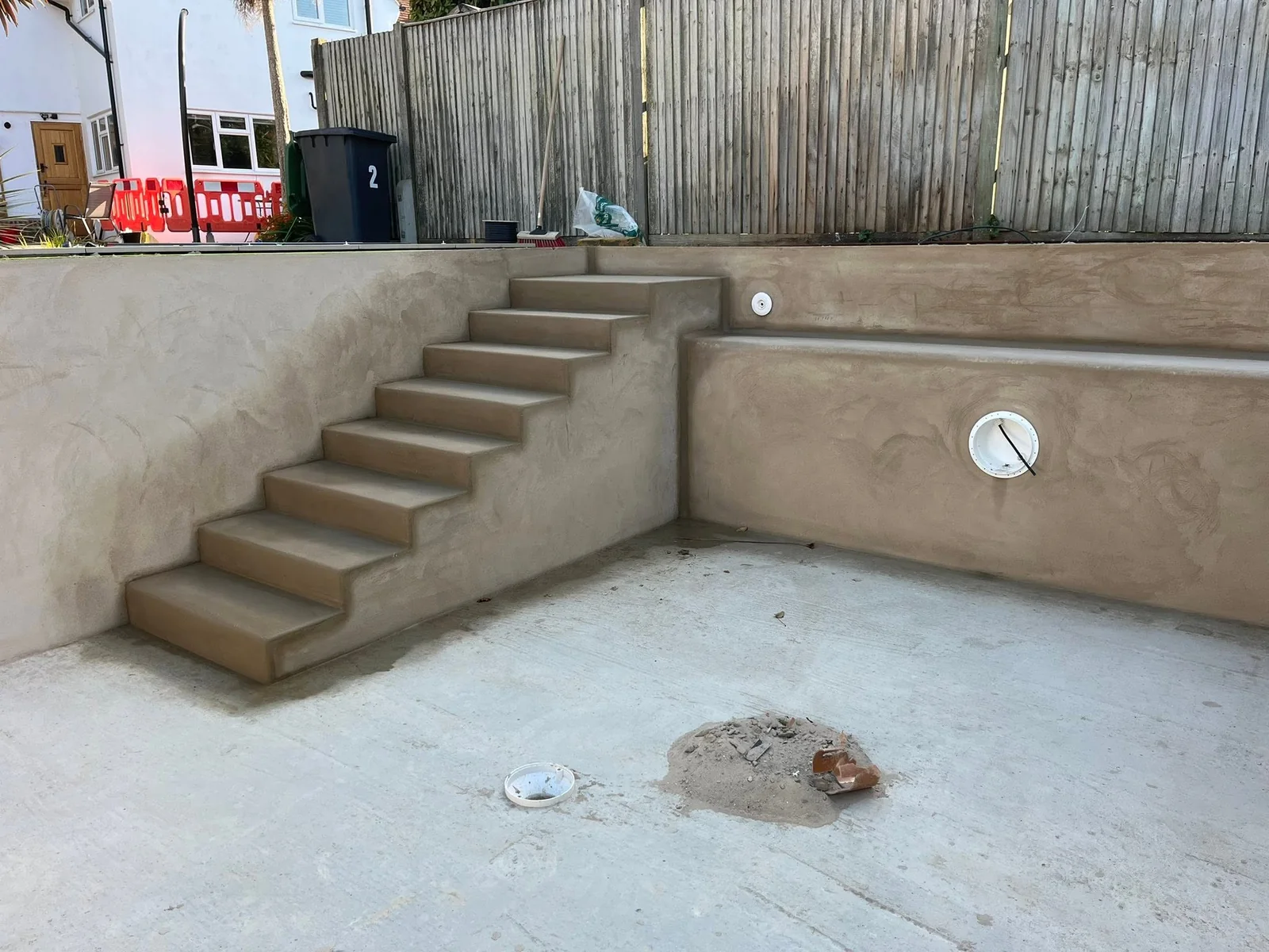 Swimming pool surround and landscaping work